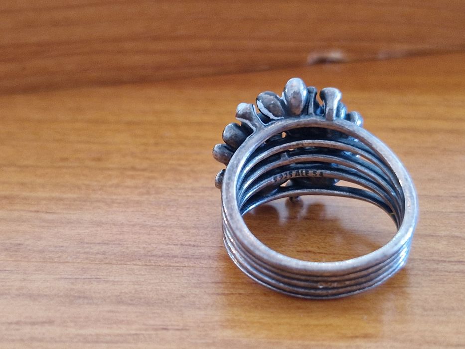 Anel Pandora em floral em tons rosa