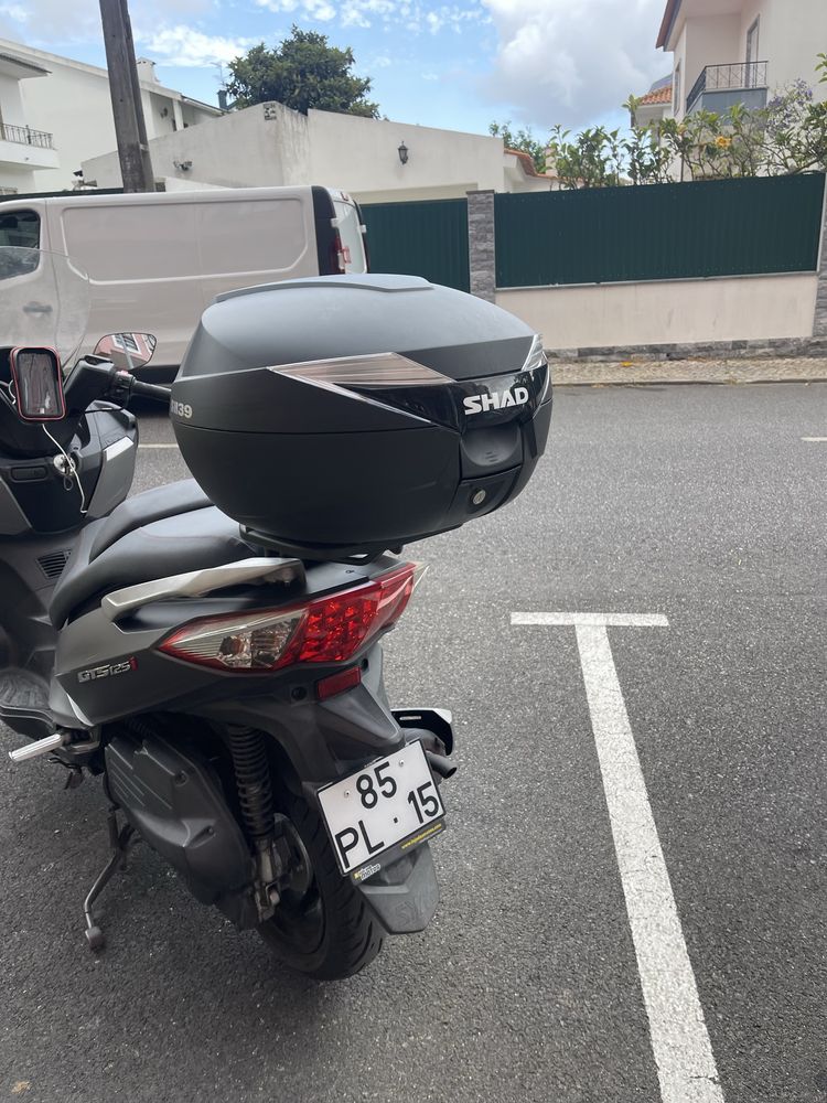 Sym 125 i gts  o motor parece um relogio ideal