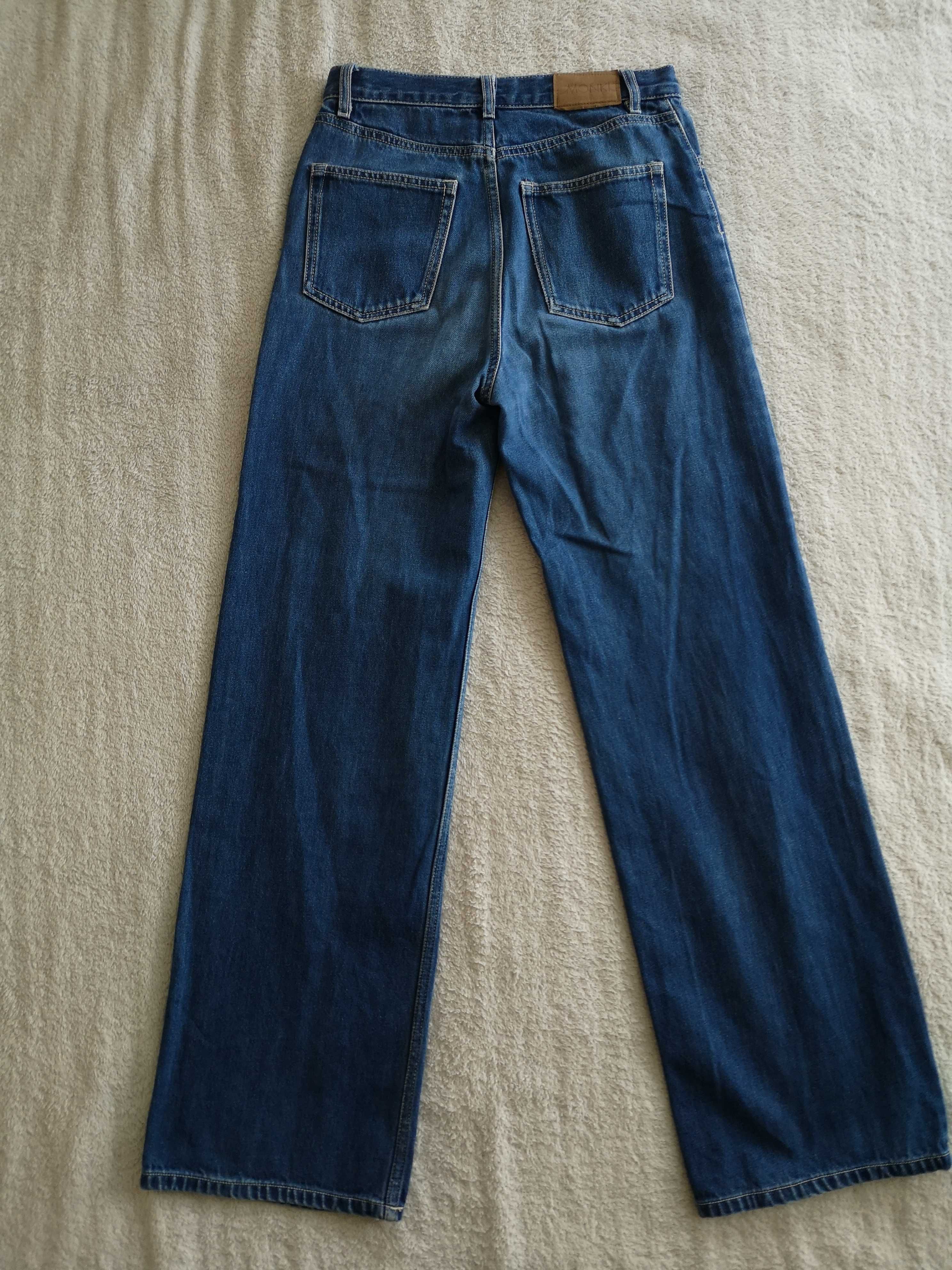Niebieskie spodnie jeansowe jeansy dzwony Monki 27 ok. 36