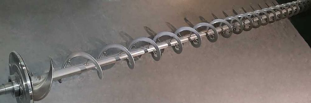 Шнековий навантажувач (погрузчик, загрузчик, конвейєр) в трубі