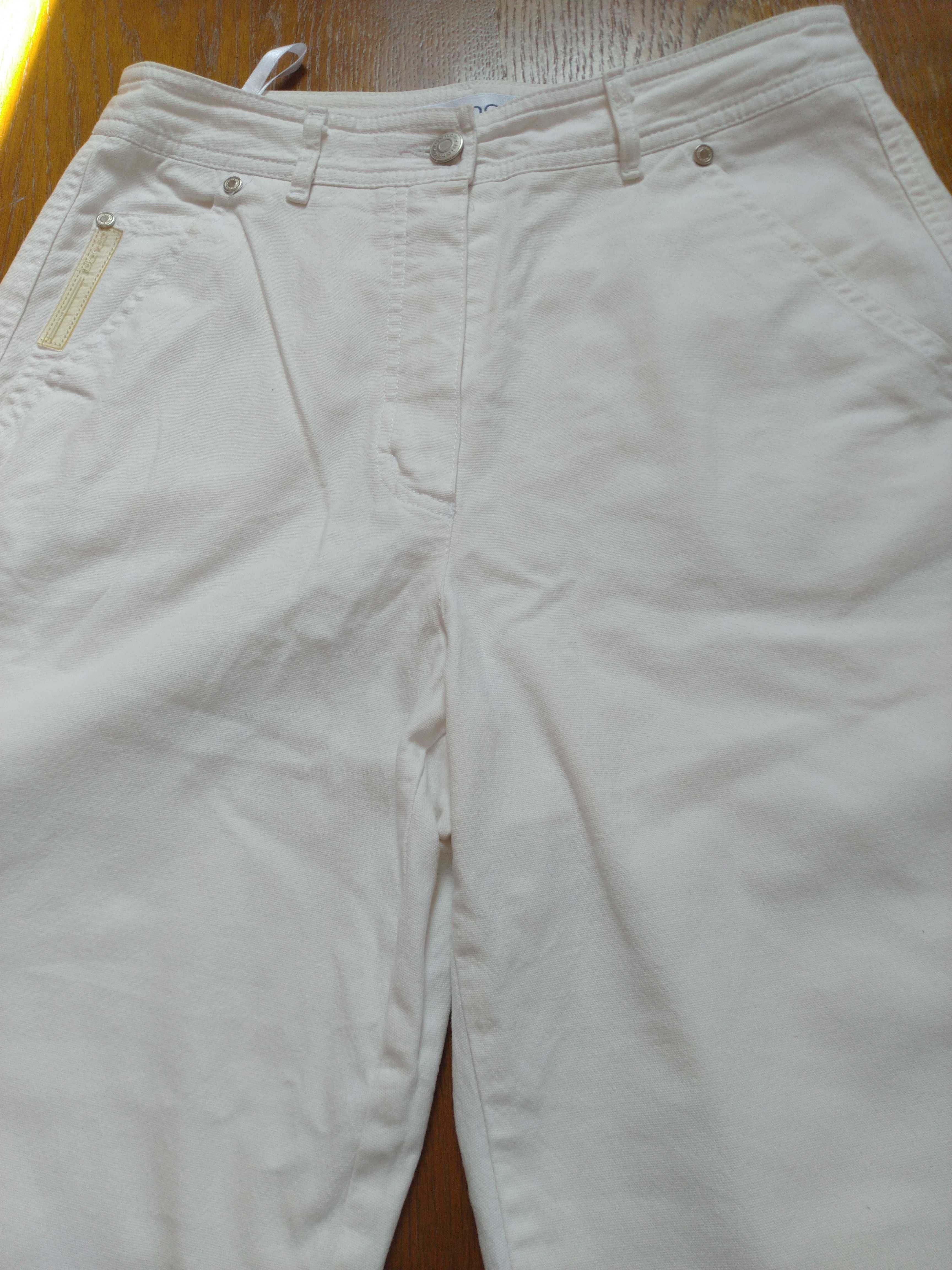 Spodnie białe prawie nowe