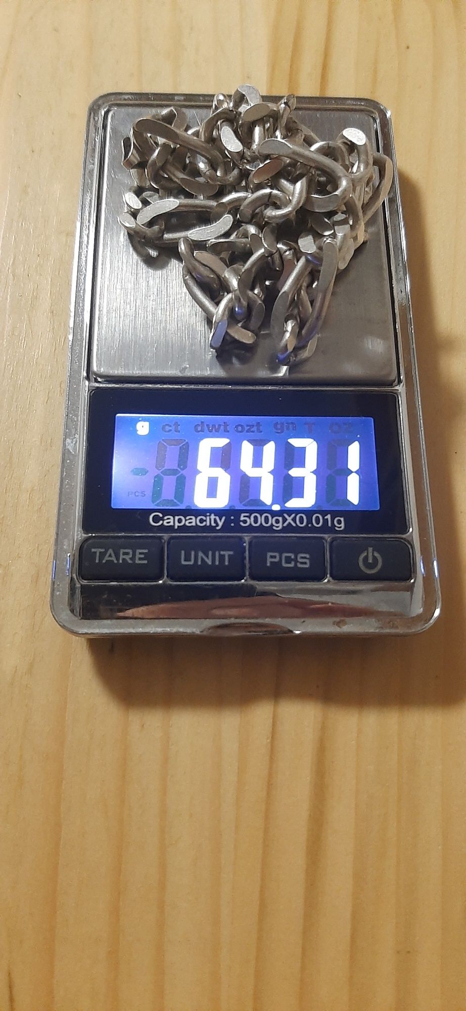 Srebrny łańcuszek „Figaro” 64,31 grama.