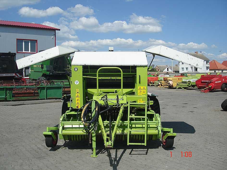 Пресс подборщик Claas Rollant 255 RotoCut UNIWRAP