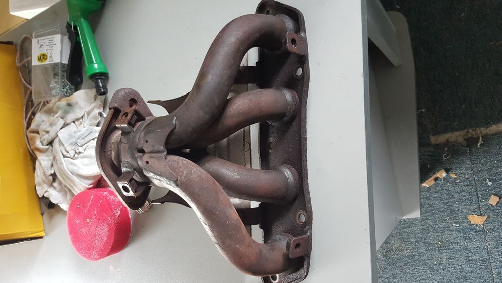 Coletor de escape toyota 1.4 vvti