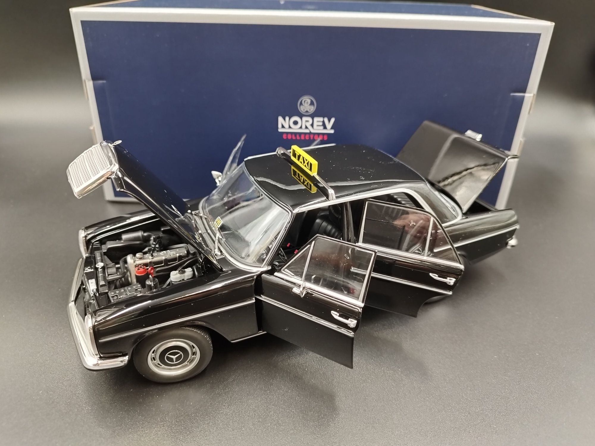 1:18 Norev 1968  Mercedes 200 W115 Taxi model nowy
