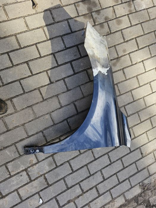 Blotnik lewy volvo xc60 I 08-13