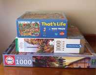 3 puzzles de 1000 peças cada um.