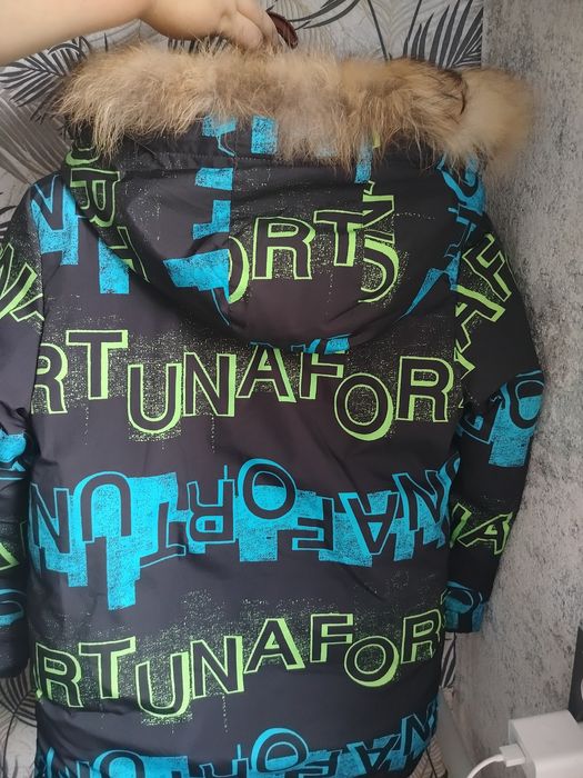 Теплюча куртка пуховик 146