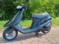 Скутер Honda tact af 24 stand up