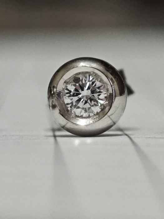Золоті сережки, з діамантами 0.2 ct, 750 проба.