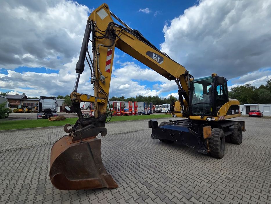 Caterpillar 318 D  Verachtert podpory + pług 3 łyżki