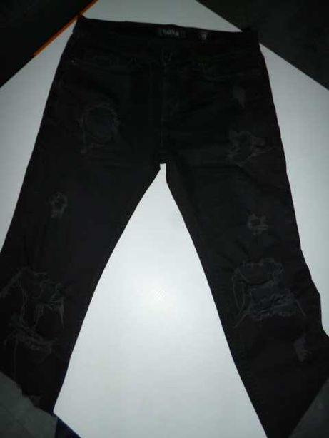Tigha spodnie męskie czarne z dziurami rozm.30/34,- pas 86 cm