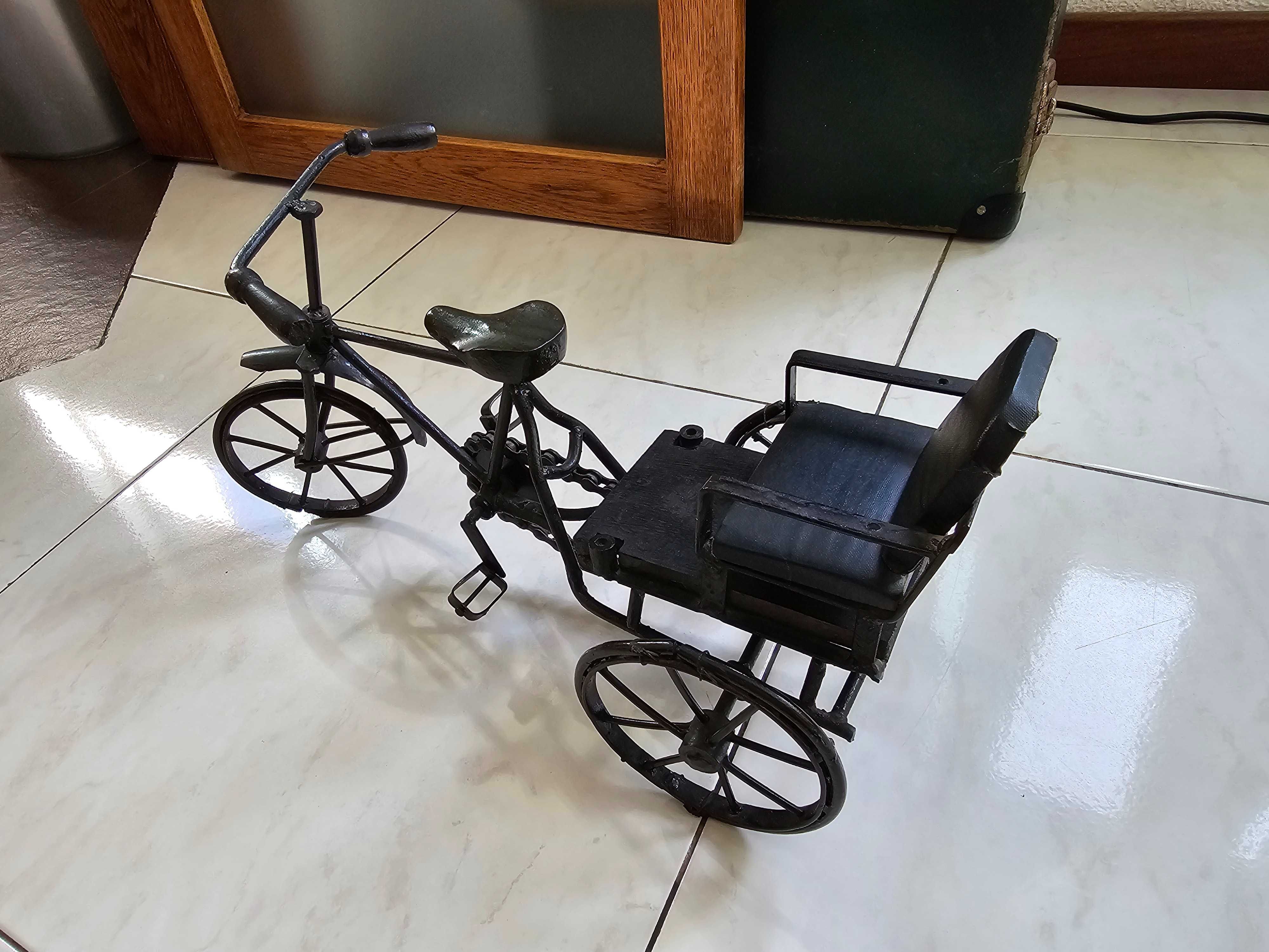 Miniatura de um ciclo-riquexó