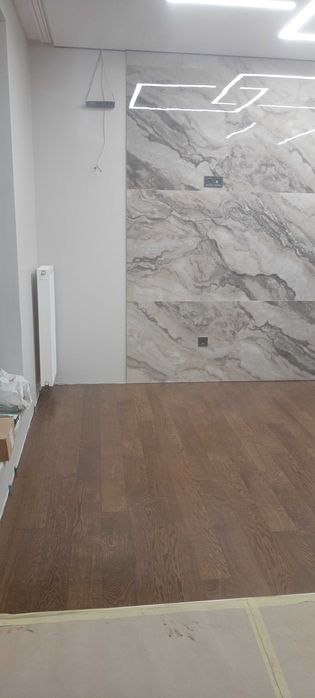 Укладка ламінату, вінілових покриттів, паркетної дошки. Шпалери