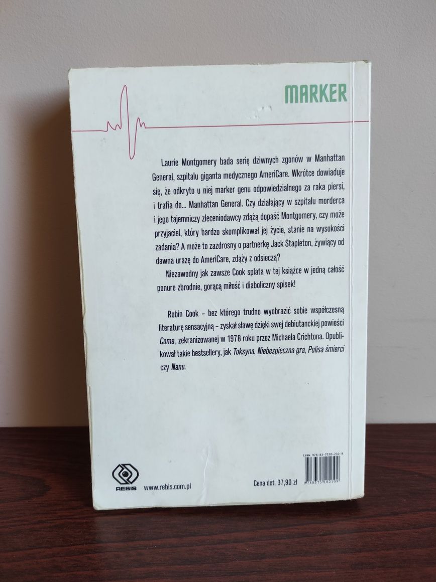Książka Marker autor Robin Cook, oprawa miękka.

„Marker” to thriller