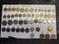 +- 180 Moedas de vários países.