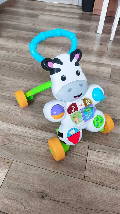 Interaktywny pchacz Zebra Fisher-Price wersja niemiecka chodzik