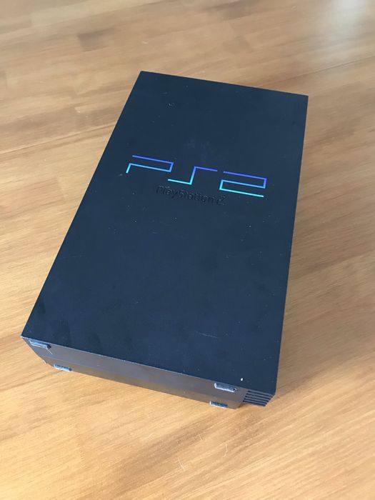 PS2 fat + comando + jogos