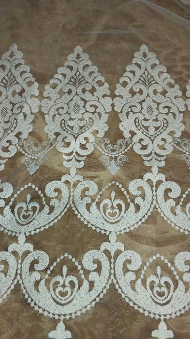 Тюль.Прошита на довжину карнизу  3м (~6м). Висота 2,5м.