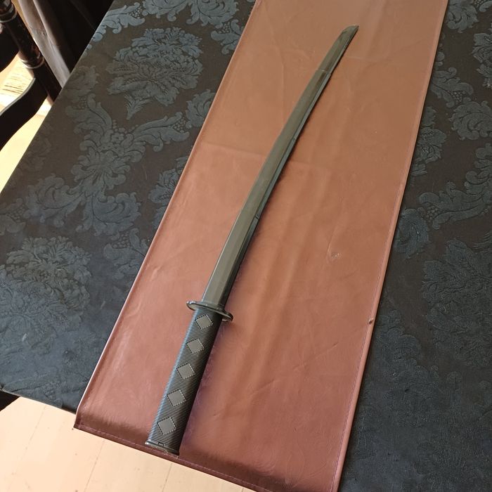 Espada samurai retráctil de plastico
