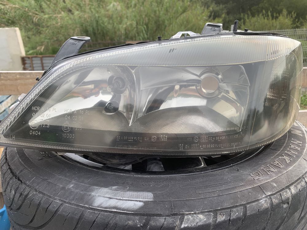 Otica / farol drto opel astra g