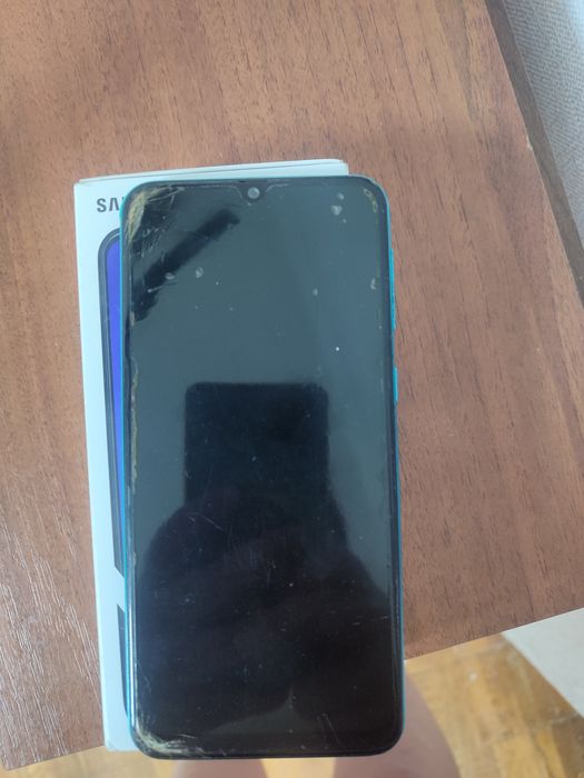 Телефон Samsung M21