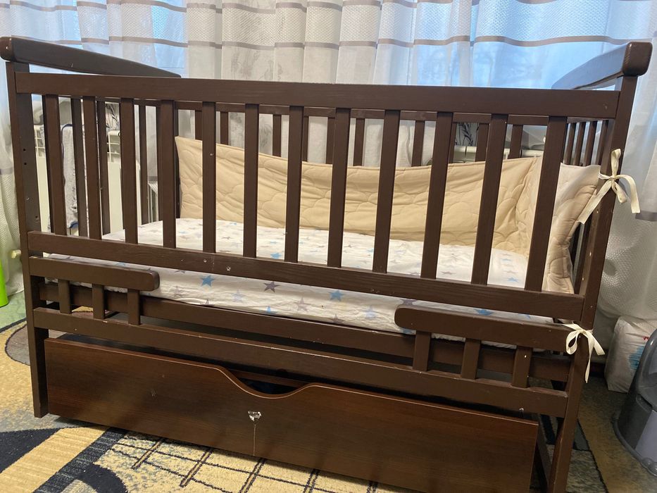 Дитяче ліжко для новонароджених