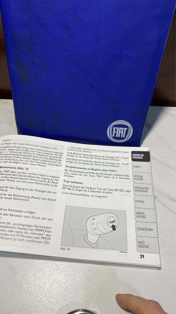 Сервисная книга к машине Fiat Doblo, значок, эмблема на руль