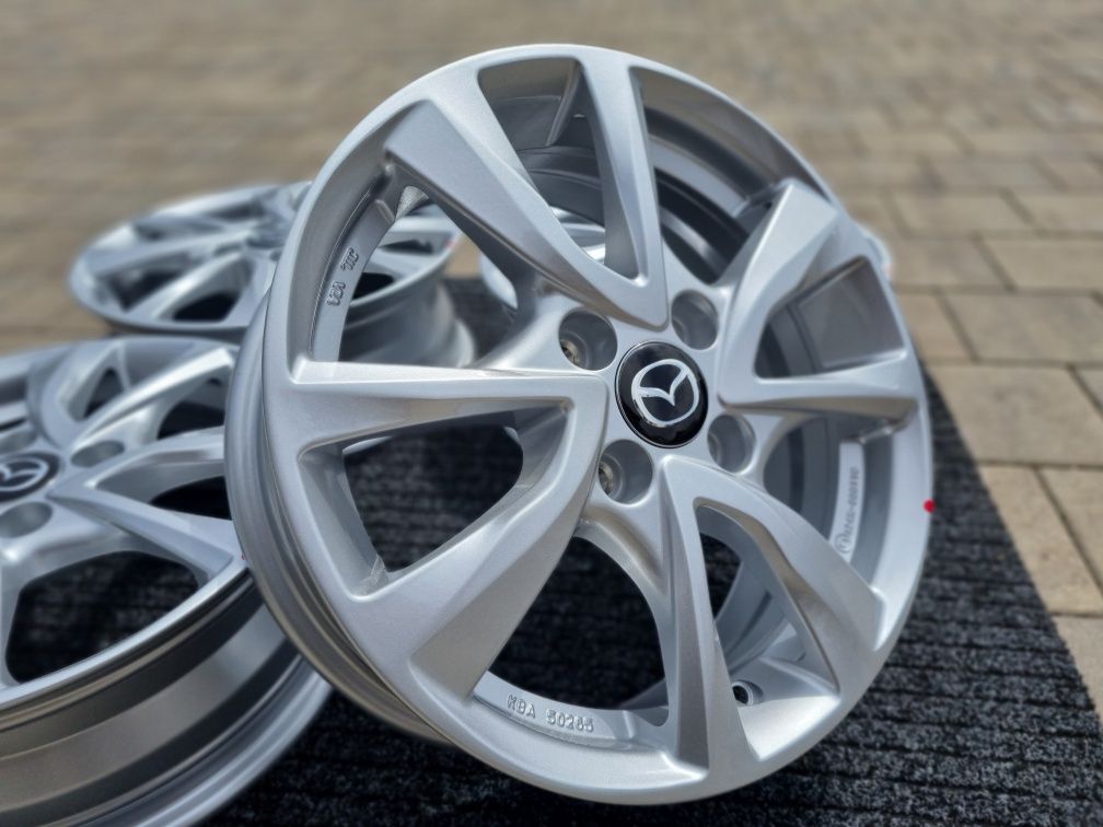 Mazda 2 felgi 15 " aluminiowe nowe 4x100 alufelgi Srebrne / Czarne
