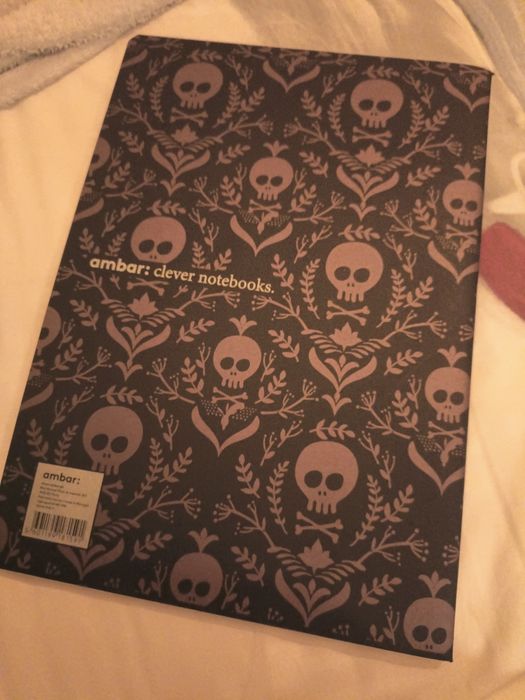 Caderno A4 caveiras - ambar