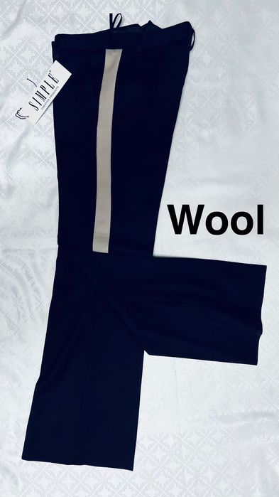 Simple eleganckie spodnie wizytowe wełniane L 40 paski z boku lampasy