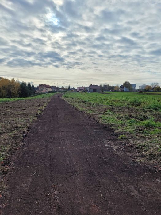 Budowa Domów fundamenty plyty fundamentowe Koparka zasypka piasek hds
