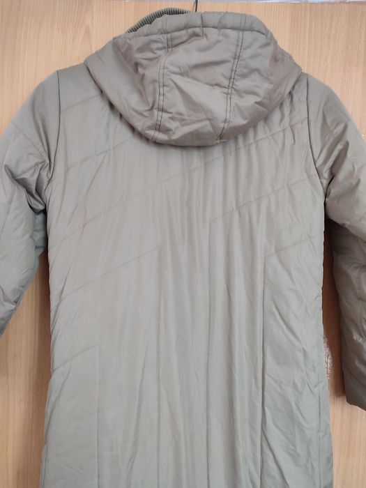 Жіноче пальто бежевого кольору