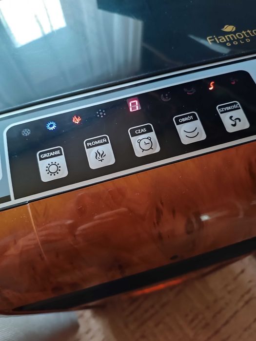 Przenośny grzejnik z funkcją kominka, klimatyzacji oraz jonizacji.