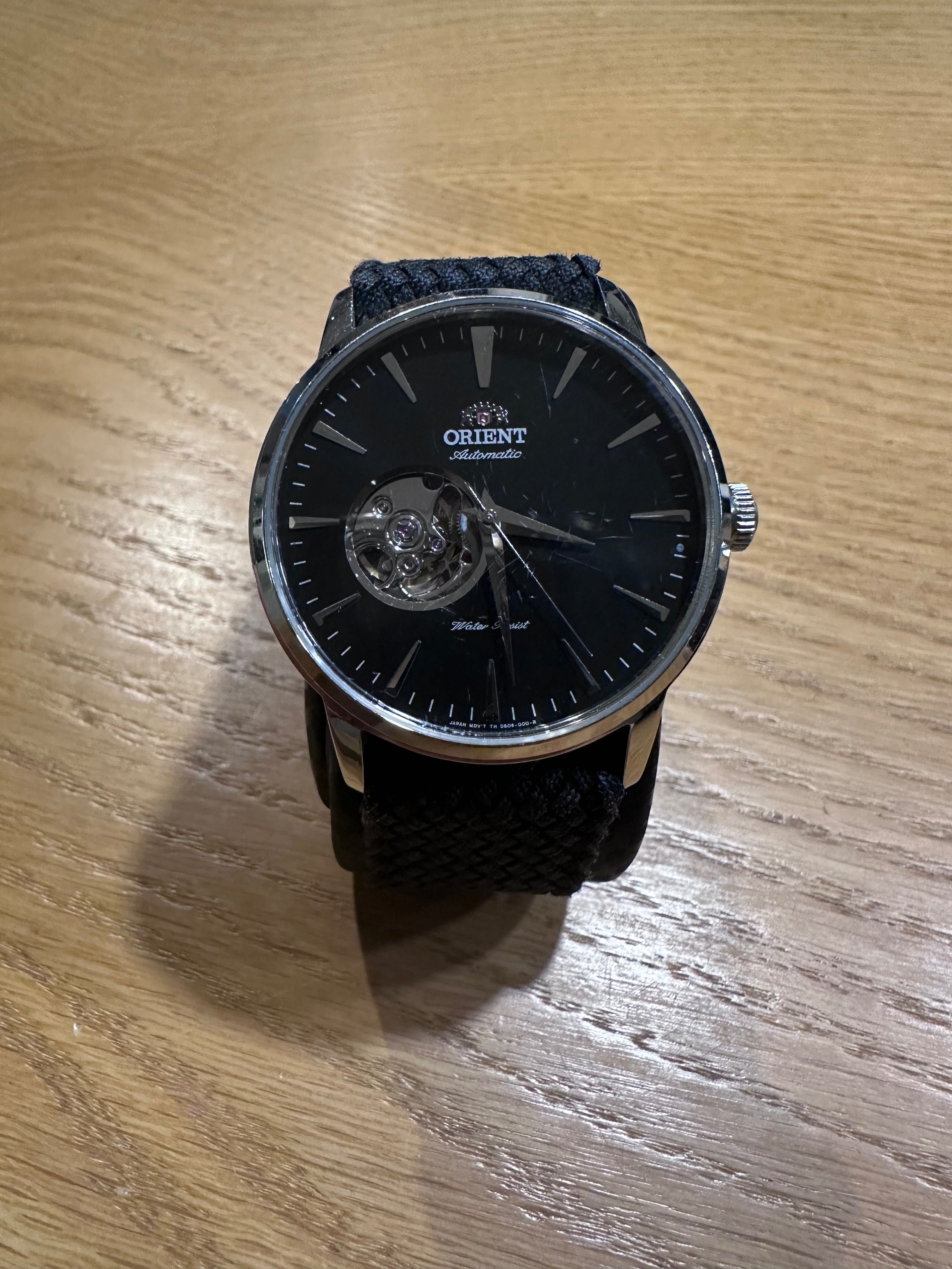 Orient esteem open heart automatic