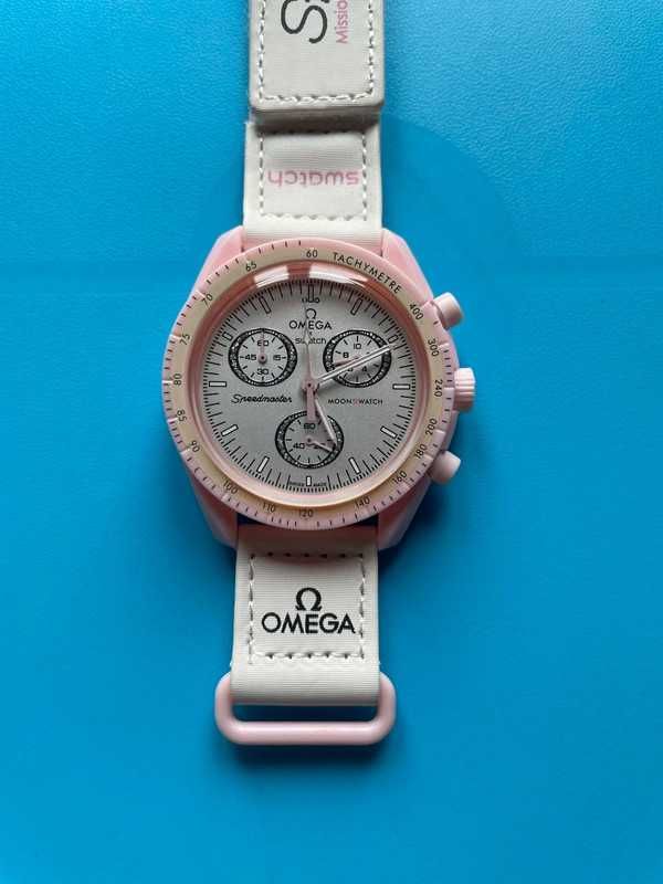 Venus SO33P100 by Omega x Swatch - Coral Glow-In-The-Dark Indices