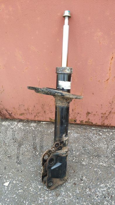 Стойка передняя правая камри 55 usa ( se.) бу