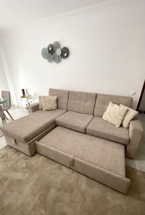 Sofá-cama com arrumação