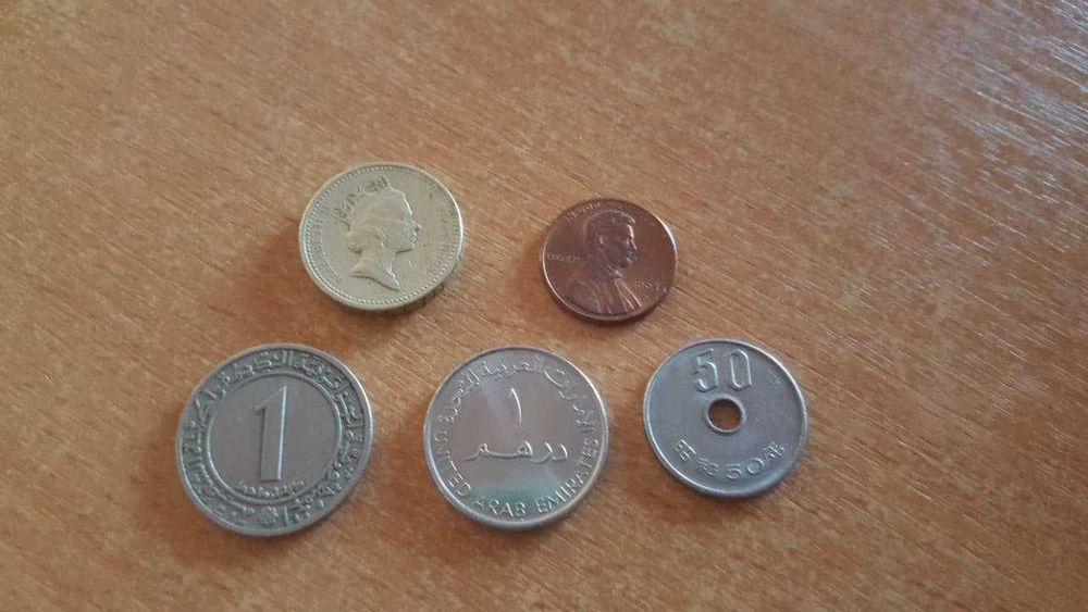 монеты  Англии, США, Алжира, ОАЭ, Японии, ЕС