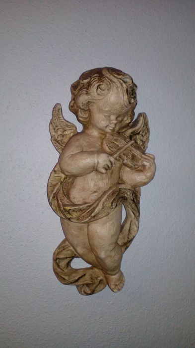 Estatuetas para colocar numa parede