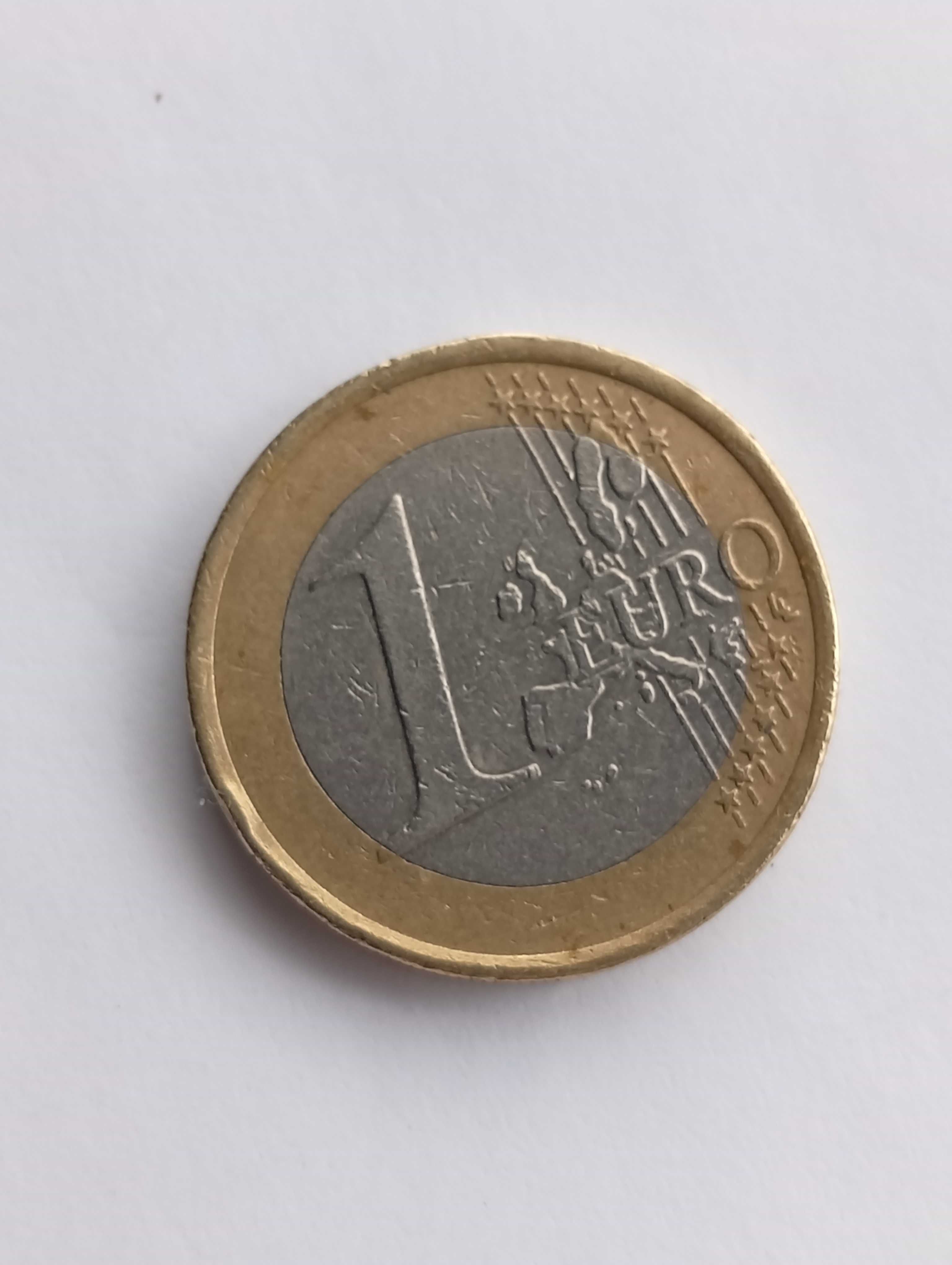 Magnífica moeda de 1€, 2002, Irlanda, circulo central com defeito.