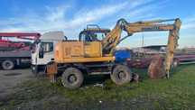Ескаватор Komatsu pw160