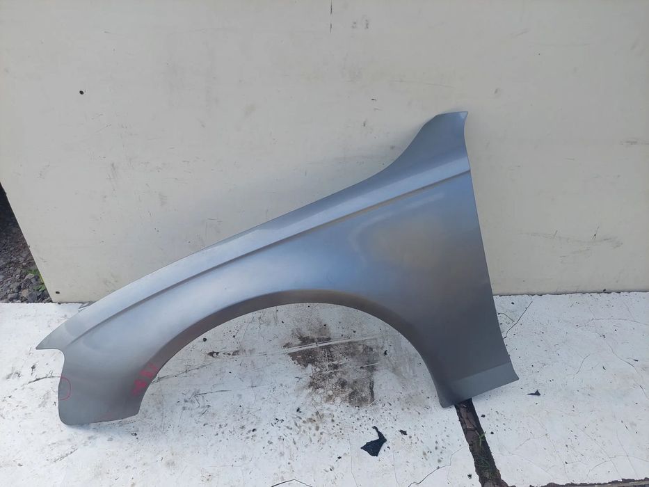 BŁOTNIK LEWY AUDI A4 B8 LY7G