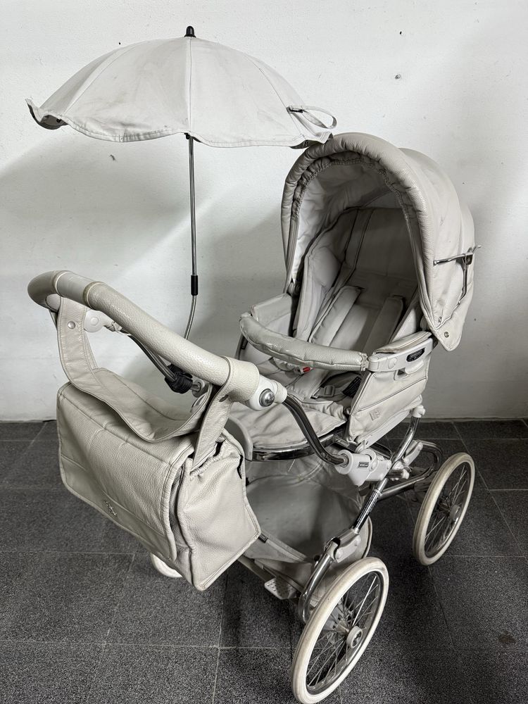 Carrinho bebecar classico - elegante e confortavel