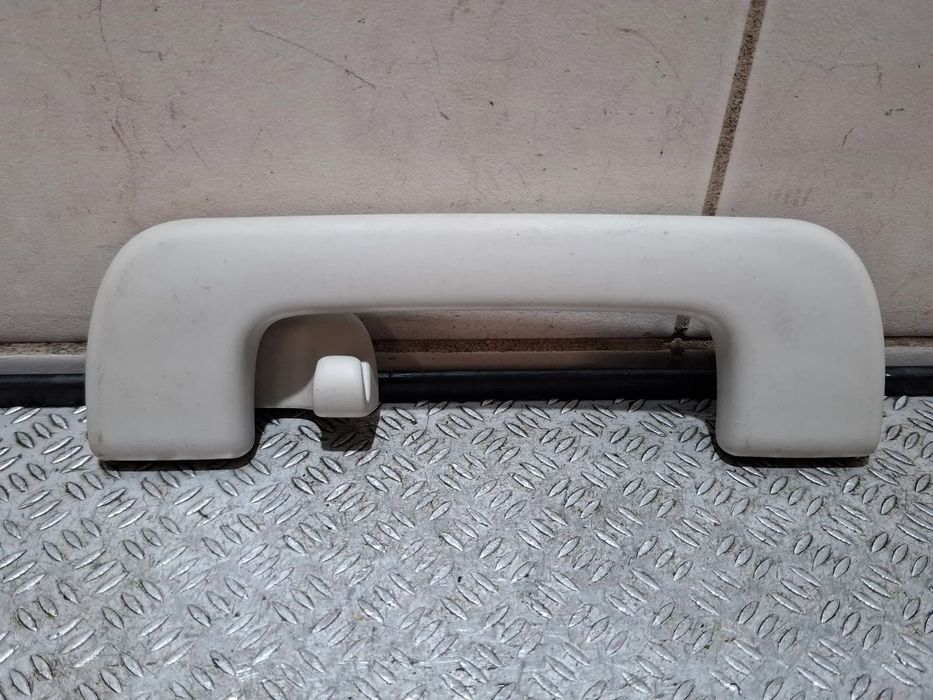 Rączka podsufitki Audi A6C7 A7 A7 A5 A4 lewy tył nr 8K0857607B