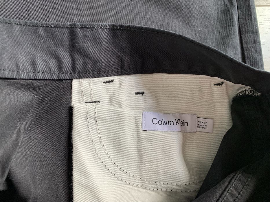 Spodnie meskie Calvin Klein chinosy 34W 30 L