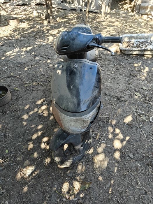 Скутер Сузукі в робочому стані