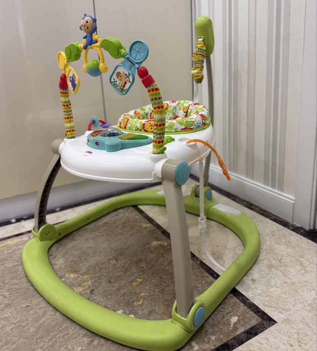 Крісло - стрибунець, ігровий столик fisher price