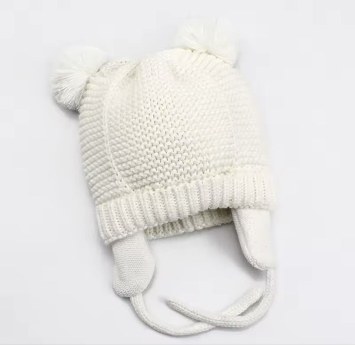 Зимова дитяча шапка тепла