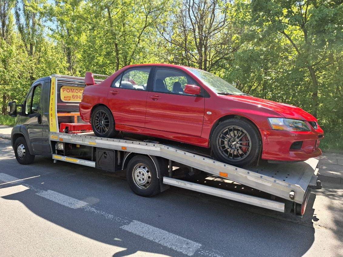 Pomoc drogowa Holowanie Transport Autolaweta  Tanio
